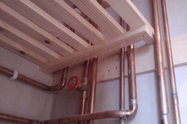 Slatted shelves and airing cupboard shelf