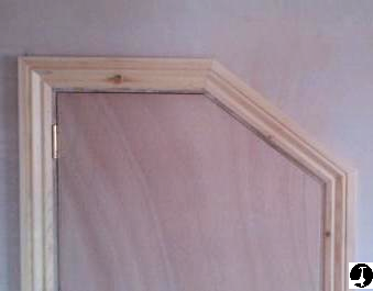 Architrave fitted to angled door