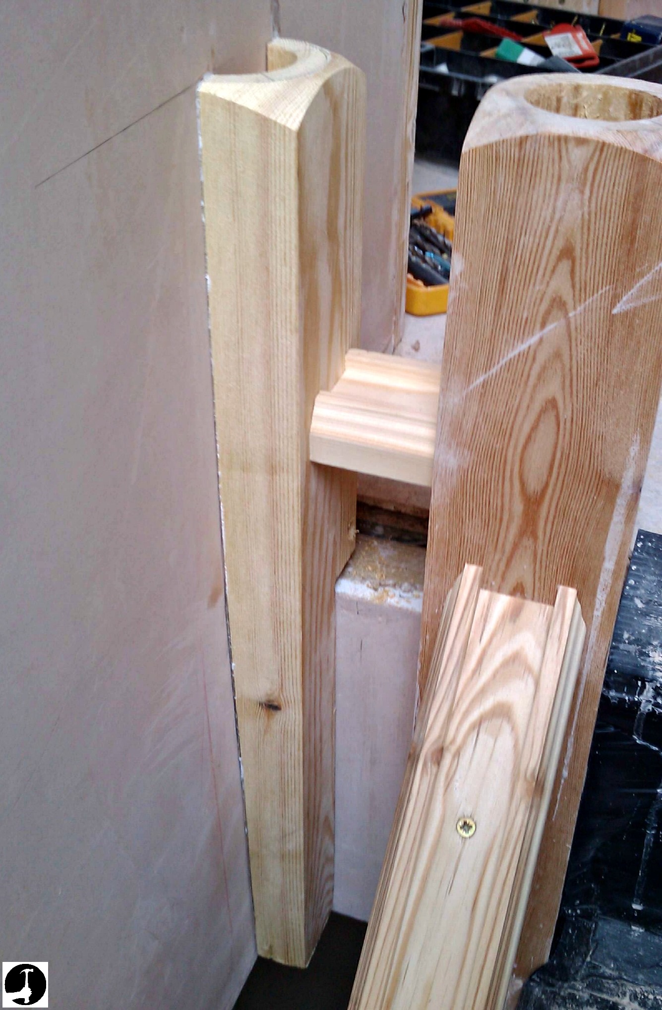 Half newel base cut and glued to the wall