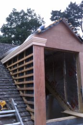 corinthian style dormer