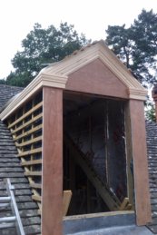 corinthian style dormer